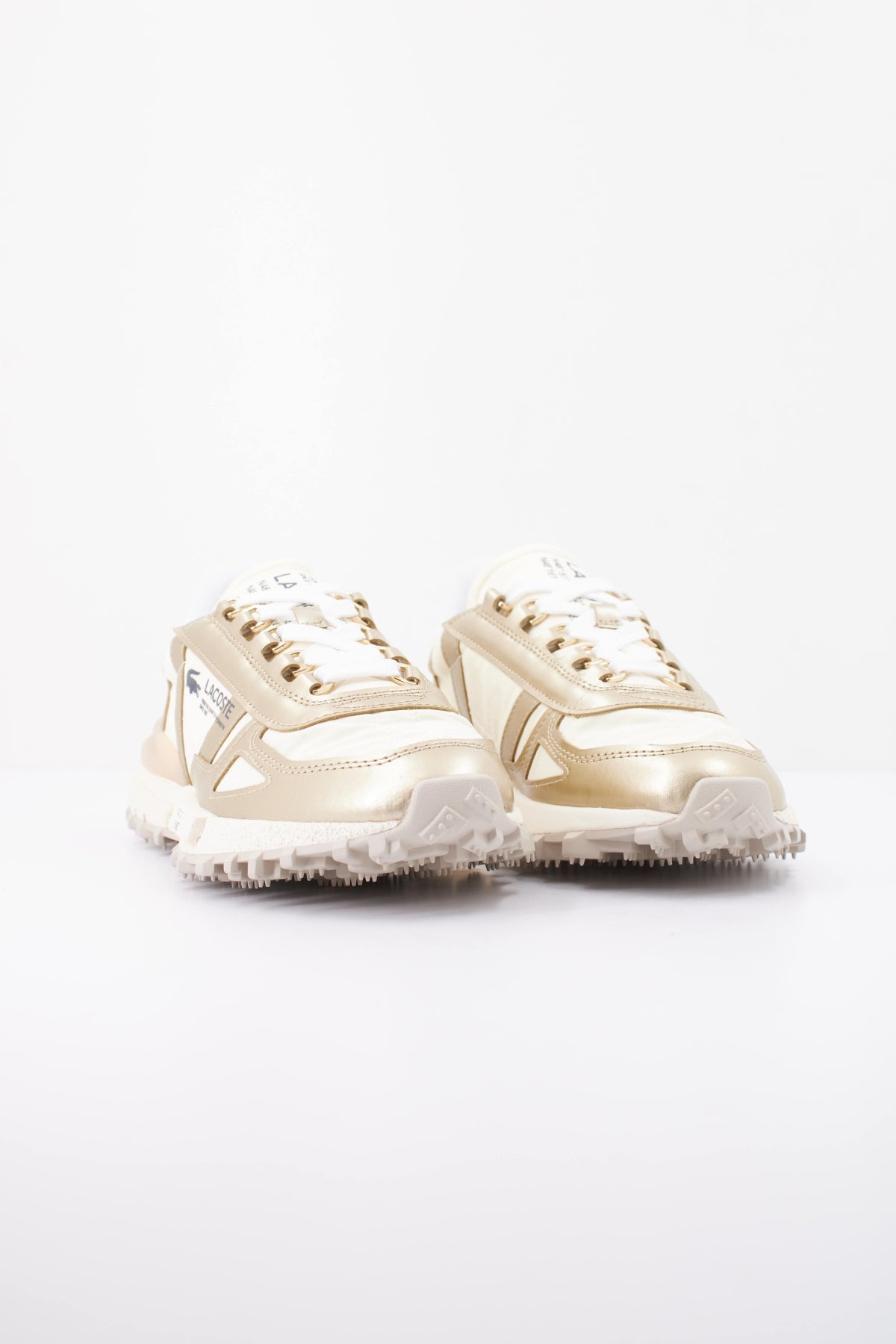 LACOSTE ELITE ACTIVE en color ORO (2)