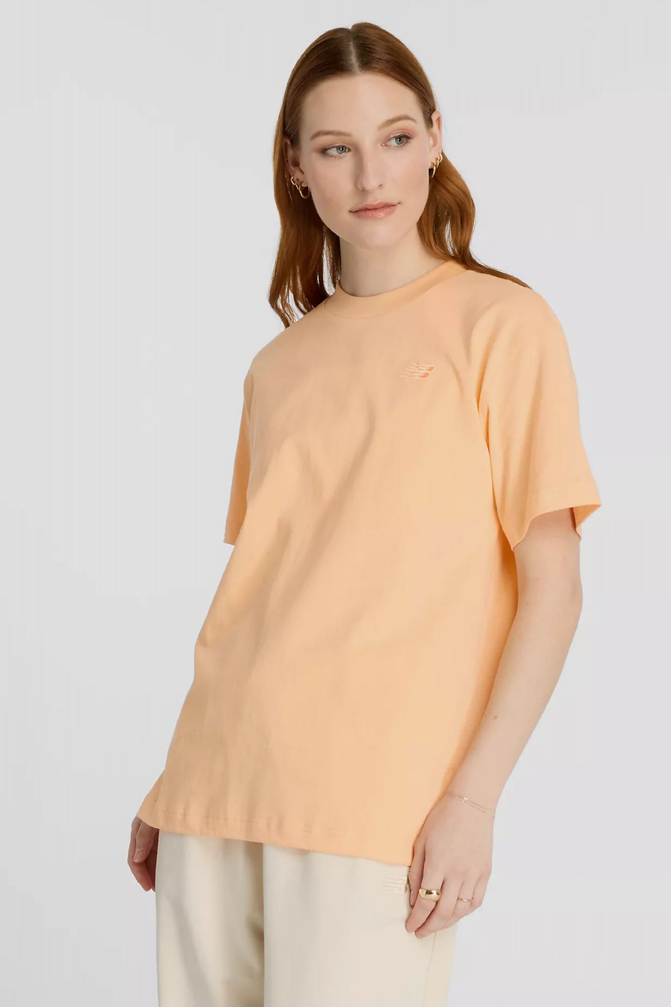 NEW BALANCE ATHLETICS JERSEY T-SHIRT en color NARANJA (1)