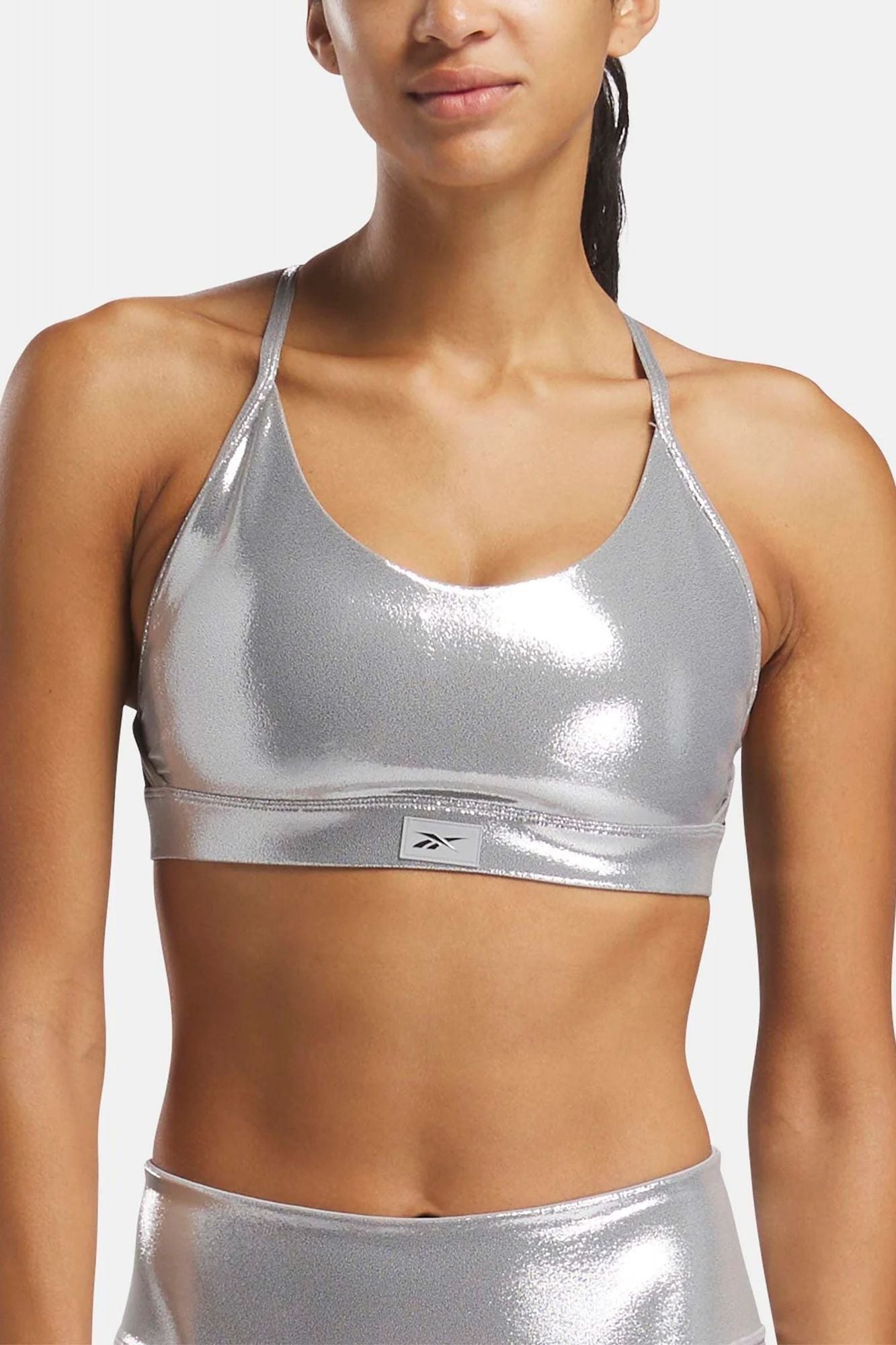 REEBOK LUX CHROME STRAPPY BRA en color PLATA (1)