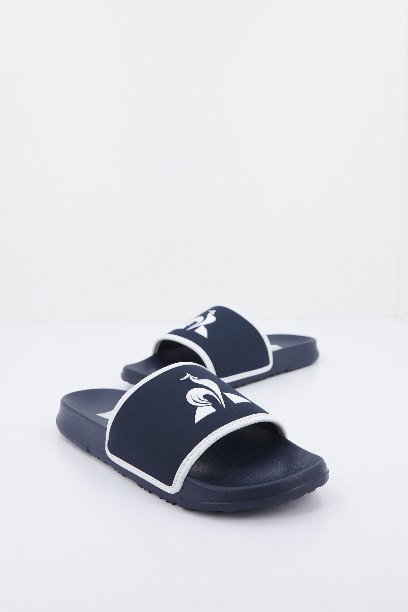 LE COQ SPORTIF SLIDE BINDING en color AZUL (1)