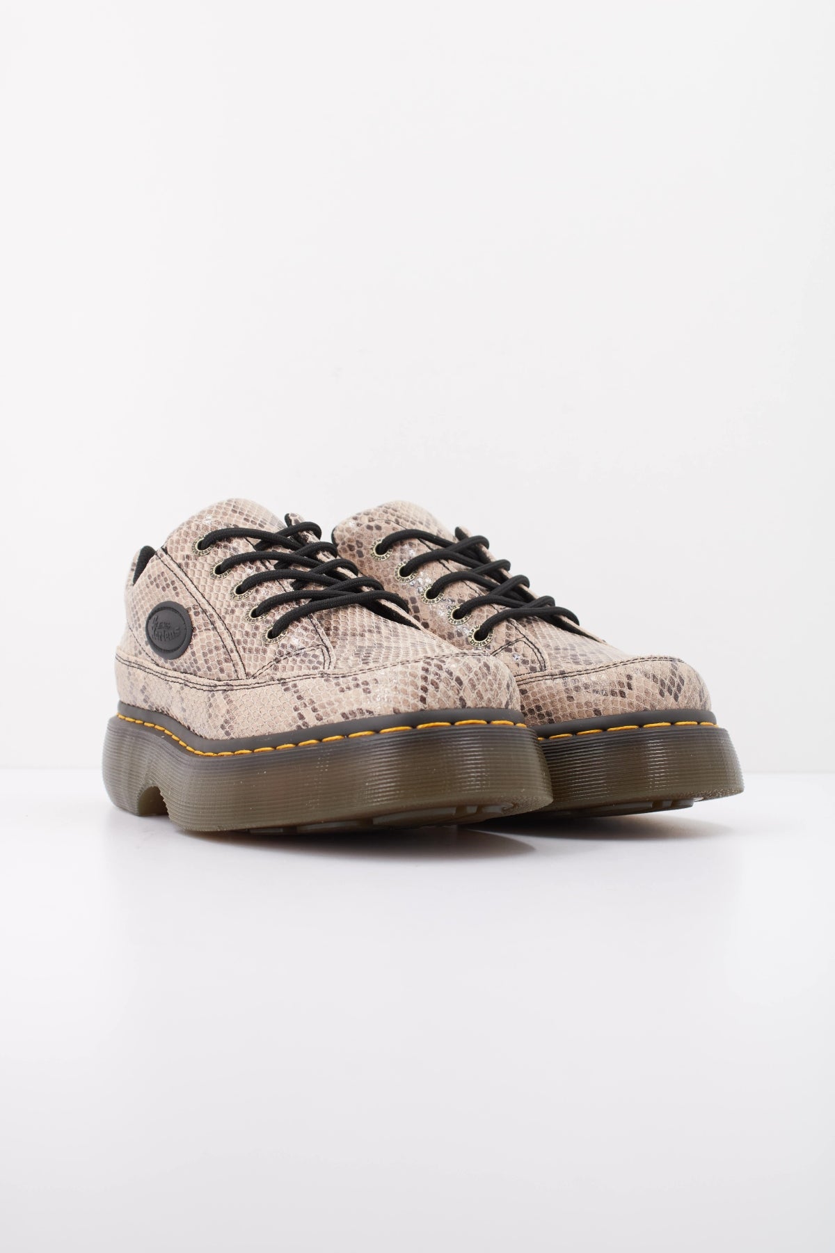 DR. MARTENS BUZZ 5I 44038100 en color ANIMAL PRINT (2)