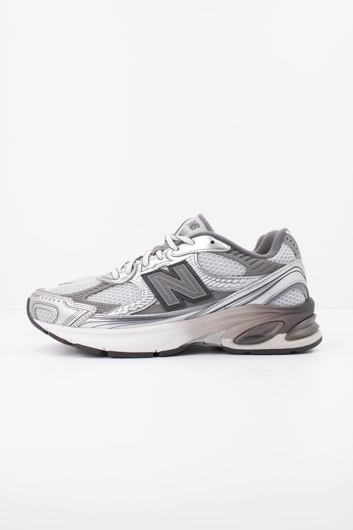 NEW BALANCE U2010 en color GRIS (1)