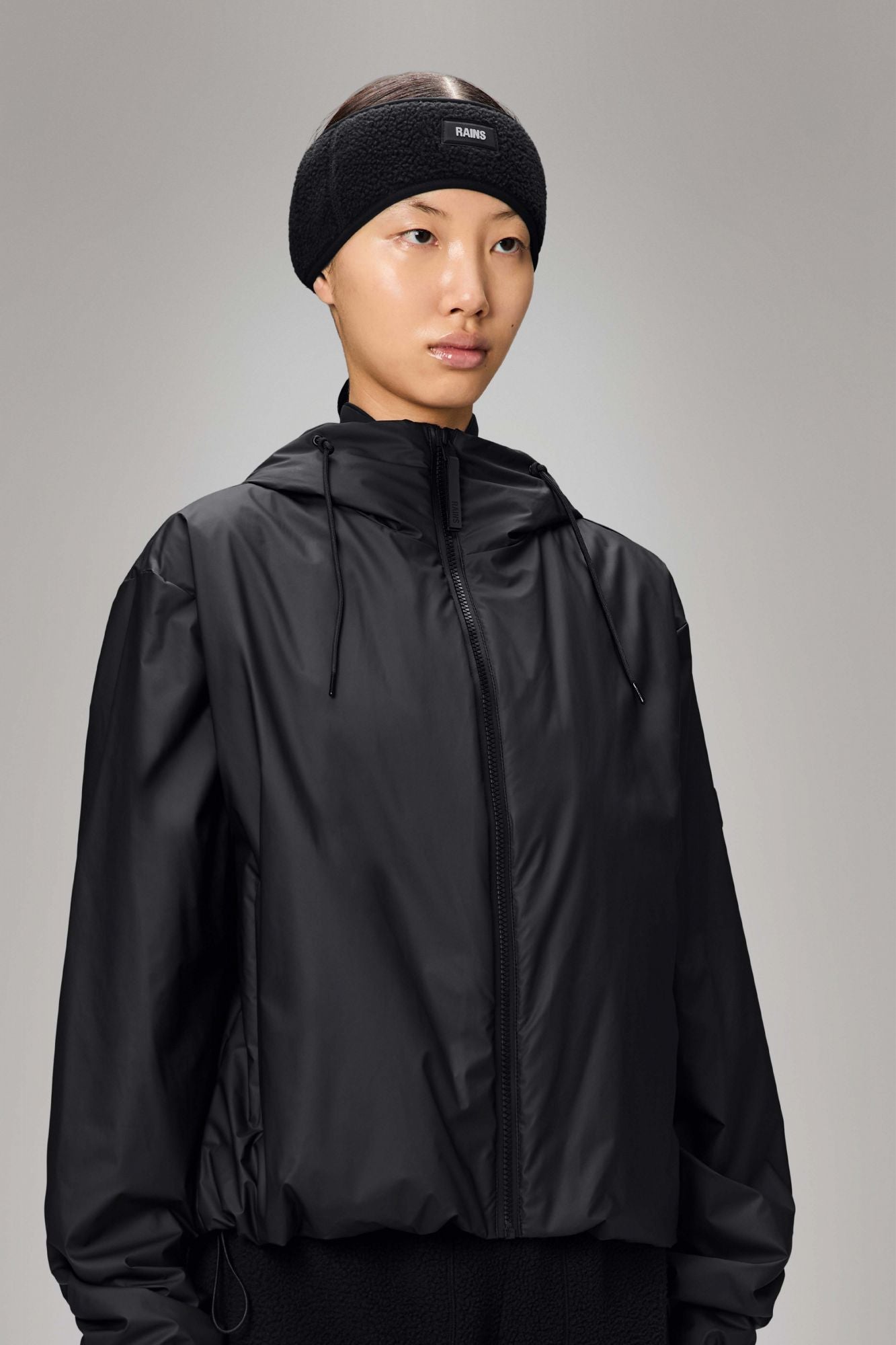 RAINS FLEECE TRAPPER HAT W2T3 en color NEGRO (2)