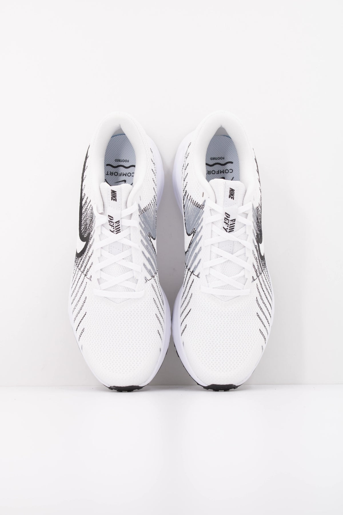 NIKE NIKE RUN DEFY en color BLANCO (3)